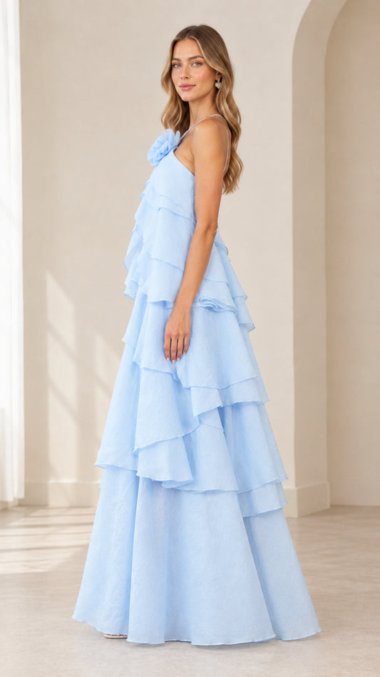 Side full-length view of model in Sky Blue tiered ruffle evening gown