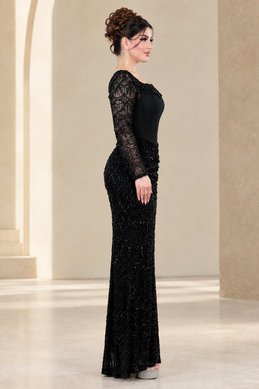 Side profile view of black beaded floor-length formal gown