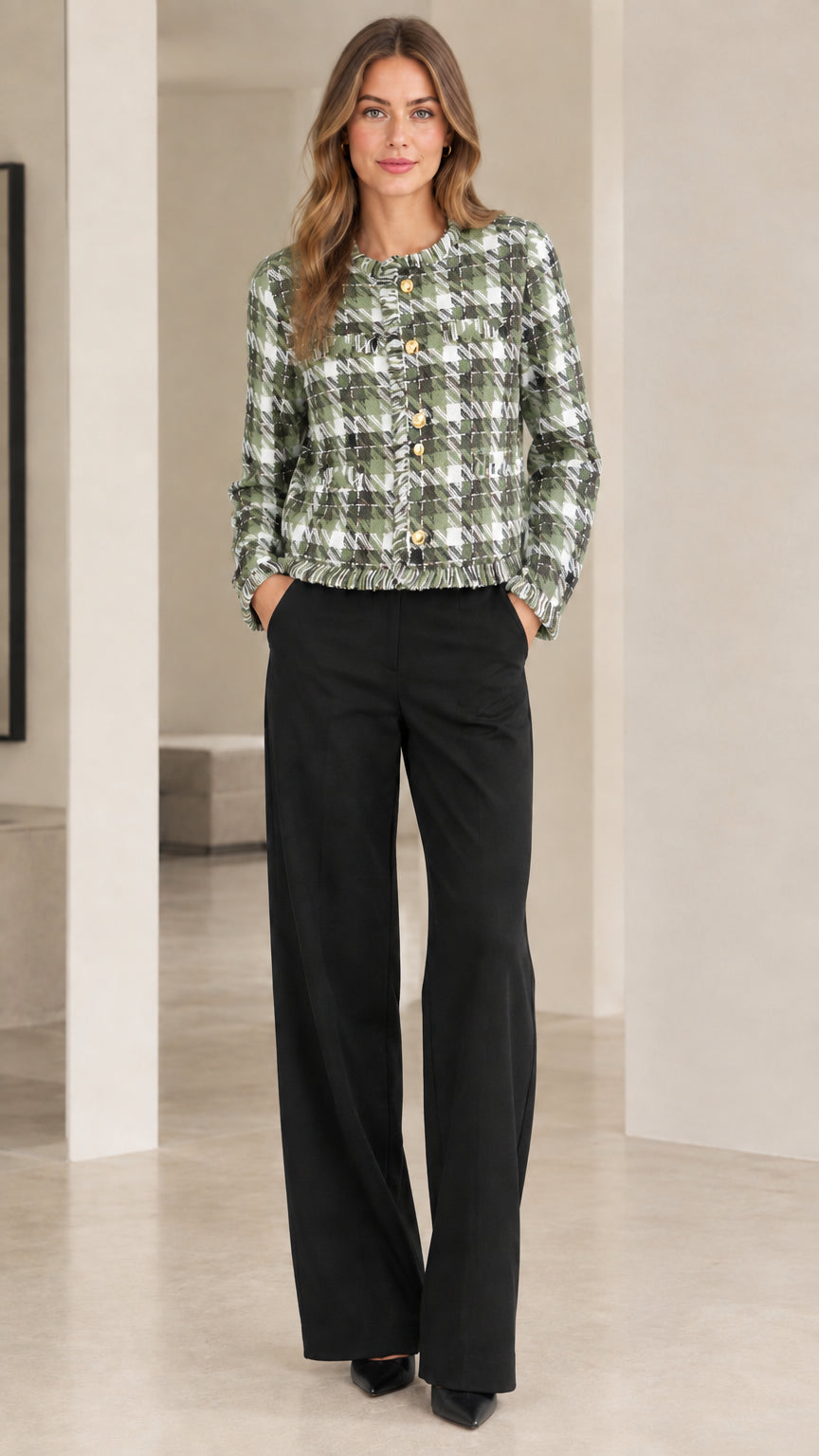 Model wearing sage green and white plaid tweed cropped jacket