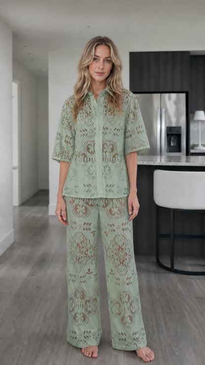 Woman wearing sage green floral lace two-piece matching set