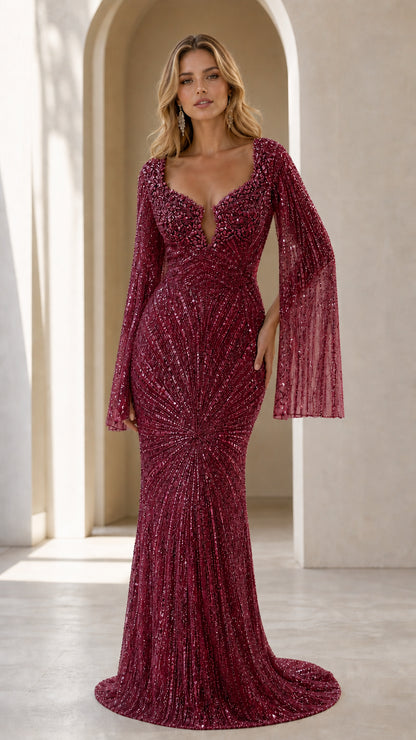 Model wearing rich burgundy wine beaded maxi gown with plunging neckline